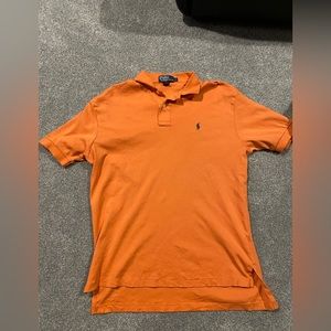 Ralph Lauren polo, gently worn, orange with dark green horse. Size large.